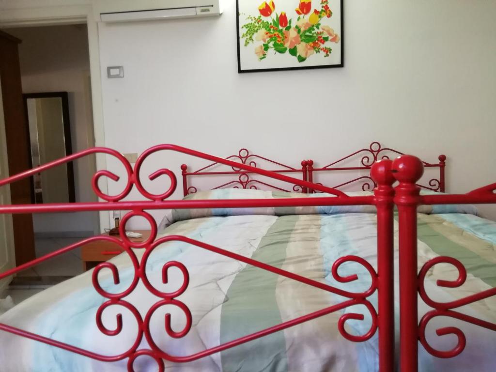 Postel nebo postele na pokoji v ubytování La brezza del Sud