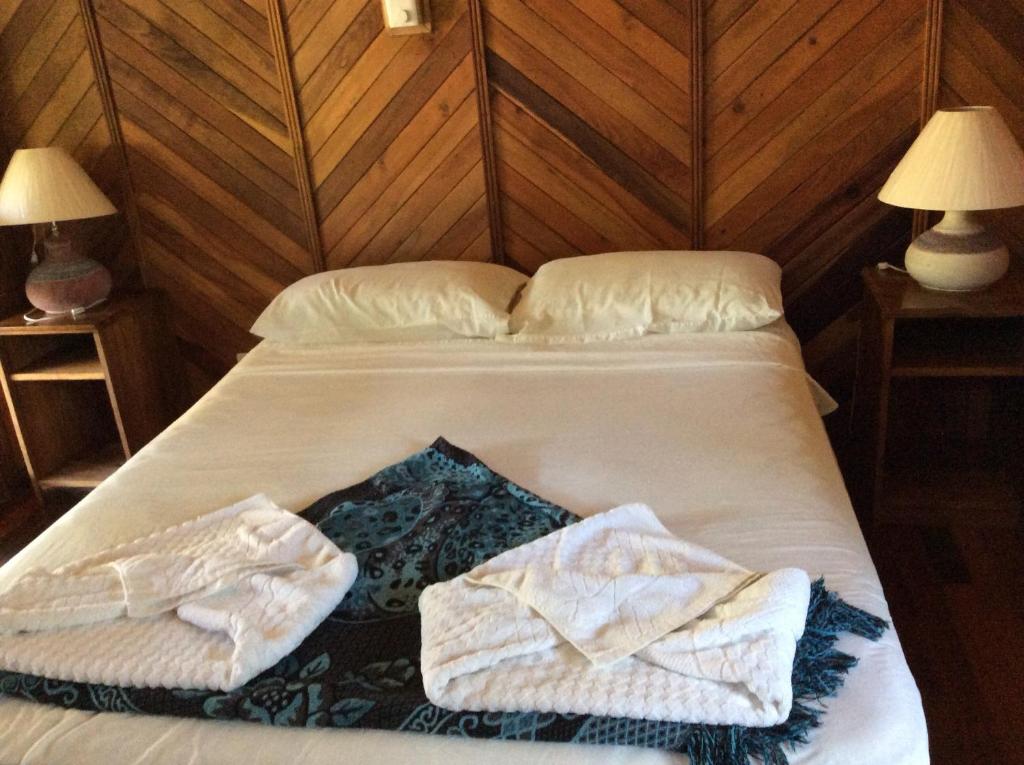 Postel nebo postele na pokoji v ubytování Villas de la Bahia Playa Tambor