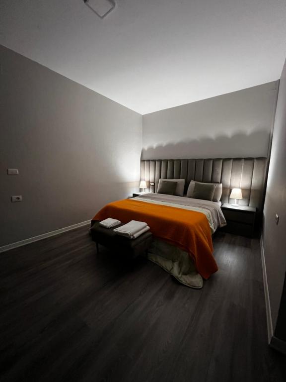 Postel nebo postele na pokoji v ubytování Bejart Apartment 1