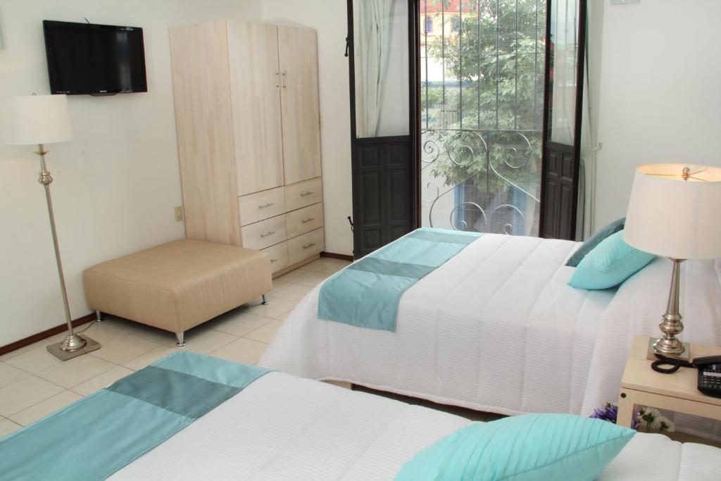 Hotel La Casa de María - Chambre Double Avec Deux Lits Doubles