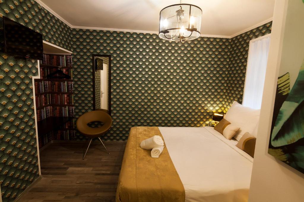 Llit o llits en una habitació de Classy Boutique