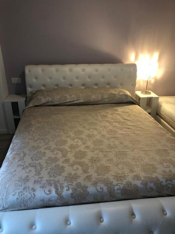 Postel nebo postele na pokoji v ubytování INTERNO 2 Este centro