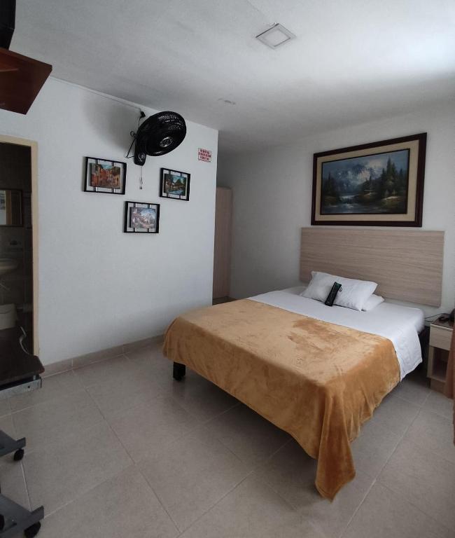Postel nebo postele na pokoji v ubytování Hotel Mirador Plaza