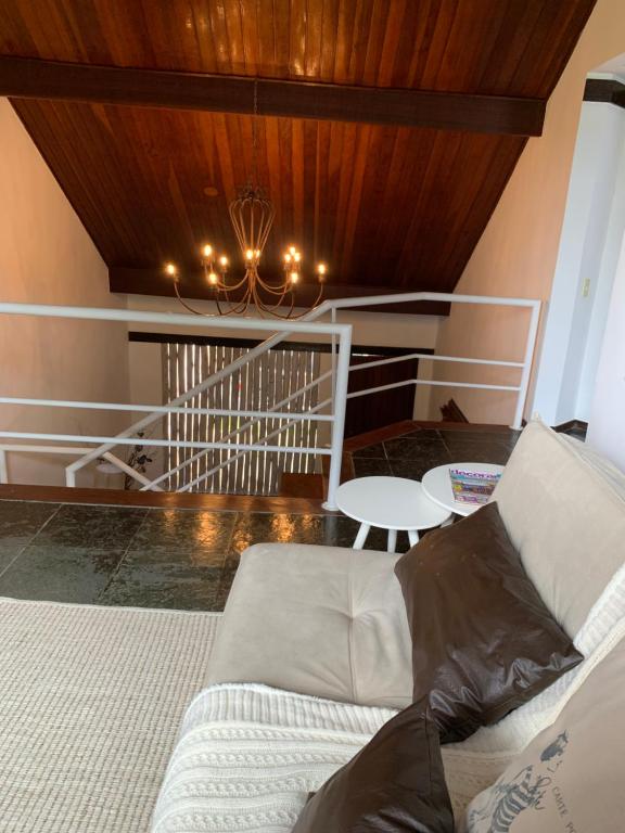 Posezení v ubytování Almas gêmeas quarto casal