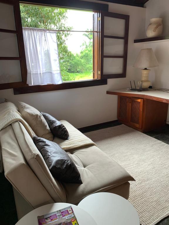 Posezení v ubytování Almas gêmeas quarto casal