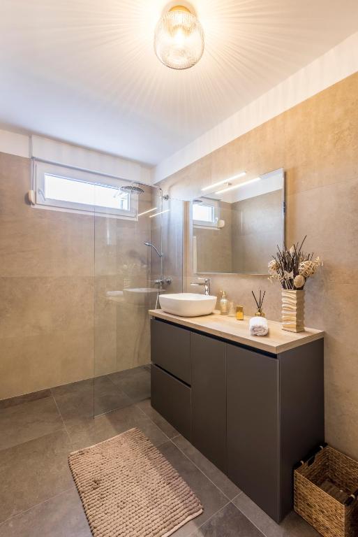 Kúpeľňa v ubytovaní Luxury rooftop apartment Zalato