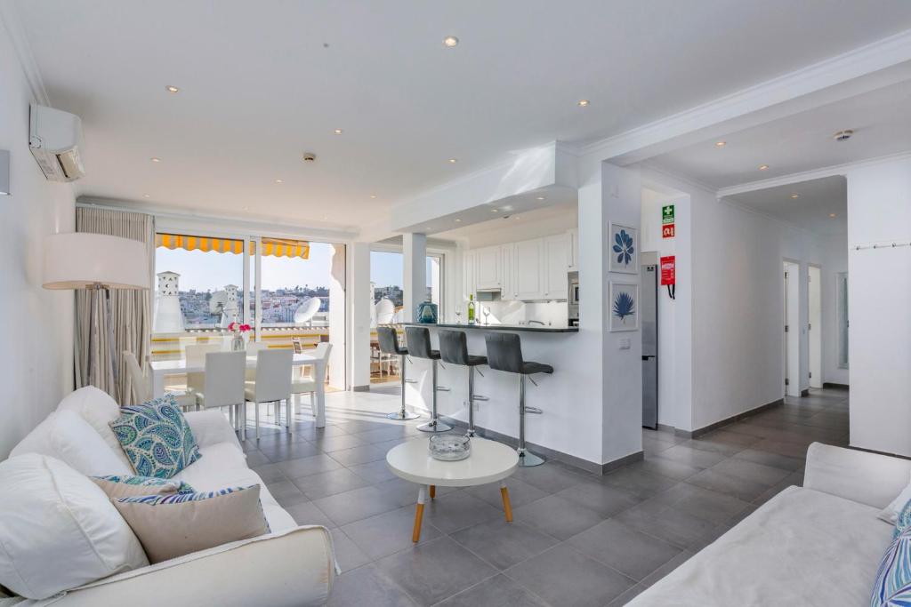 A cozinha ou cozinha compacta de Old Town Beach Apartments