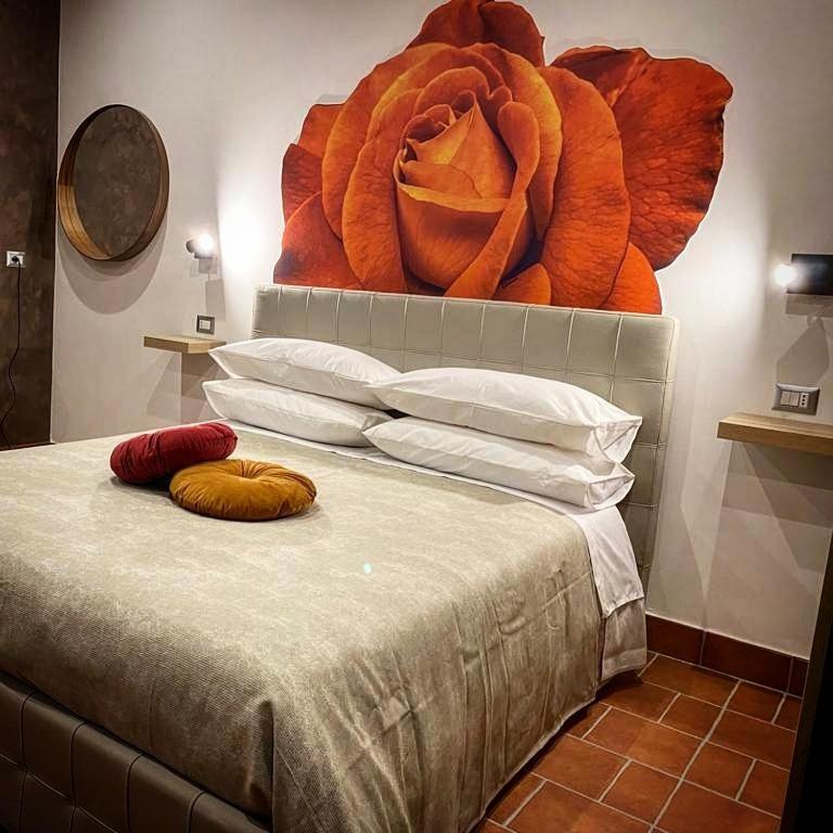 Posteľ alebo postele v izbe v ubytovaní Setteabbracci Suite & Apartments