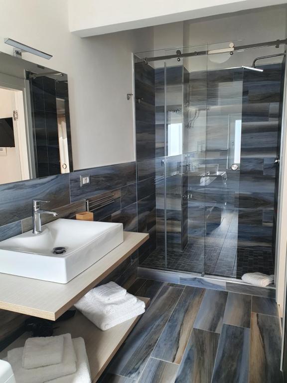 Kúpeľňa v ubytovaní Setteabbracci Suite & Apartments