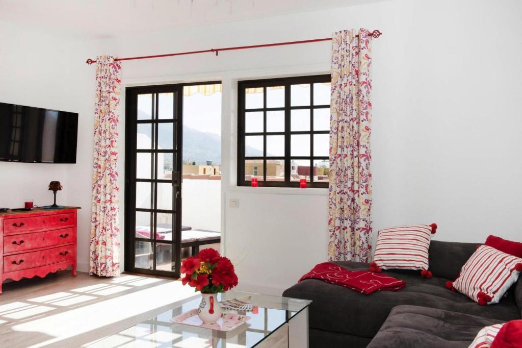 a living room with a couch and a window at Apartment, Los Llanos de Aridane in Los Llanos de Aridane