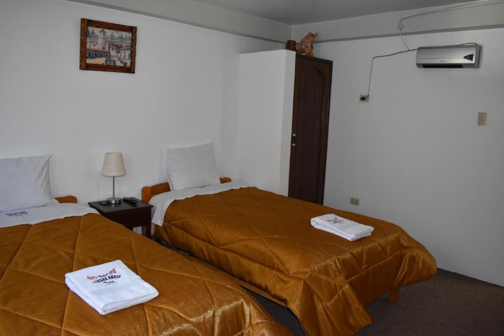 Postel nebo postele na pokoji v ubytování Pukara House