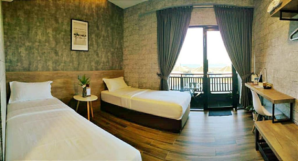 Postel nebo postele na pokoji v ubytování Cube Bed Station & Tours Sdn Bhd