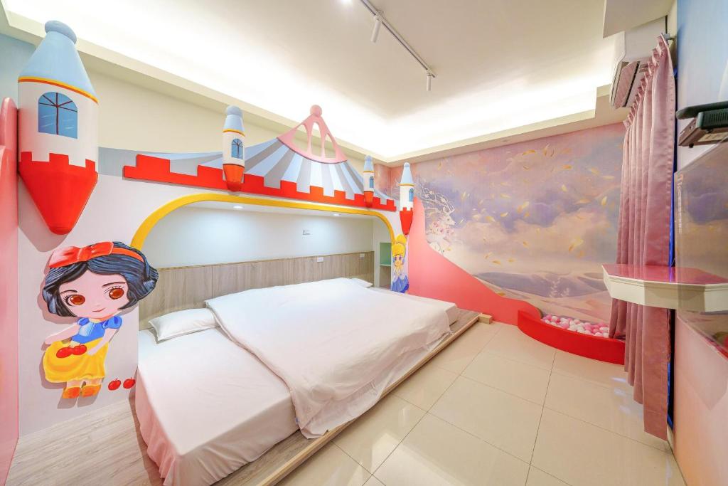 Postel nebo postele na pokoji v ubytování Jinduo Family Homestay