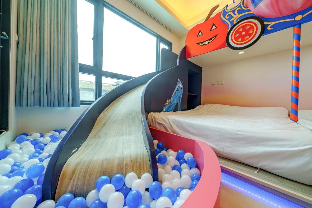 Postel nebo postele na pokoji v ubytování Jinduo Family Homestay