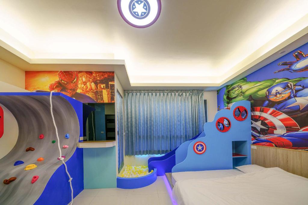 Postel nebo postele na pokoji v ubytování Jinduo Family Homestay