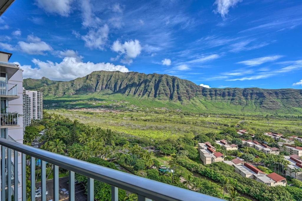 a view from the balcony of a hotel with a mountain in the background at Lush Condo with Community Pool, 1 Mi to Beach! in Waianae