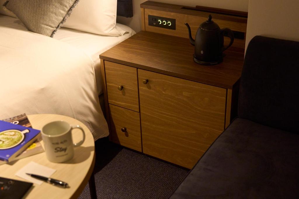 Příslušenství pro přípravu čaje a kávy v ubytování Hotel Resol Stay Akihabara