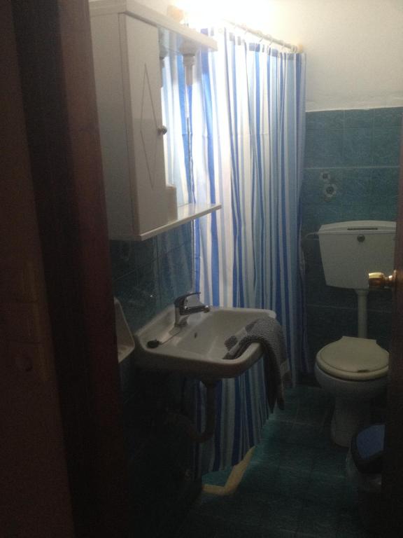 Koupelna v ubytování Dimitris Rooms