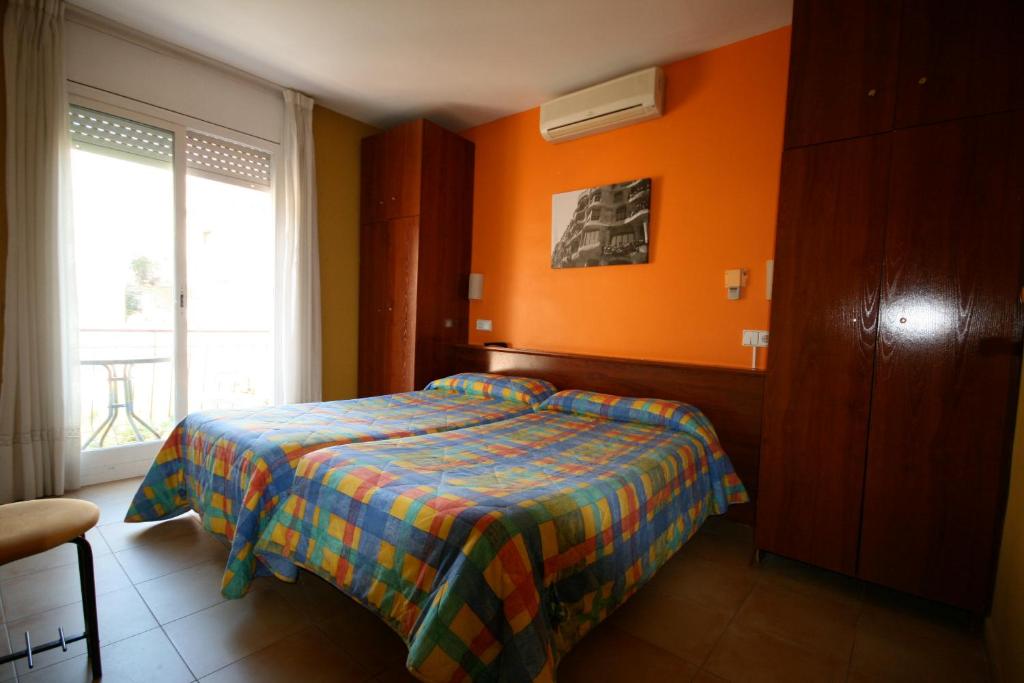 Postel nebo postele na pokoji v ubytování Hostal Termes