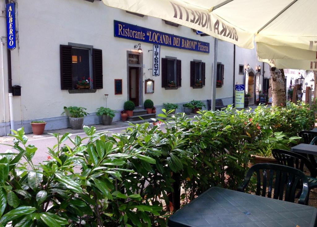 Reštaurácia alebo iné gastronomické zariadenie v ubytovaní Locanda Dei Baroni - Antica Dimora