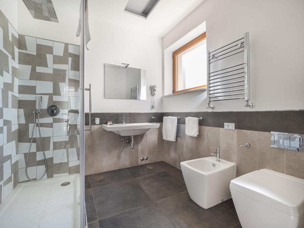 Koupelna v ubytování Orange Suites - De Vivo Realty Sorrento