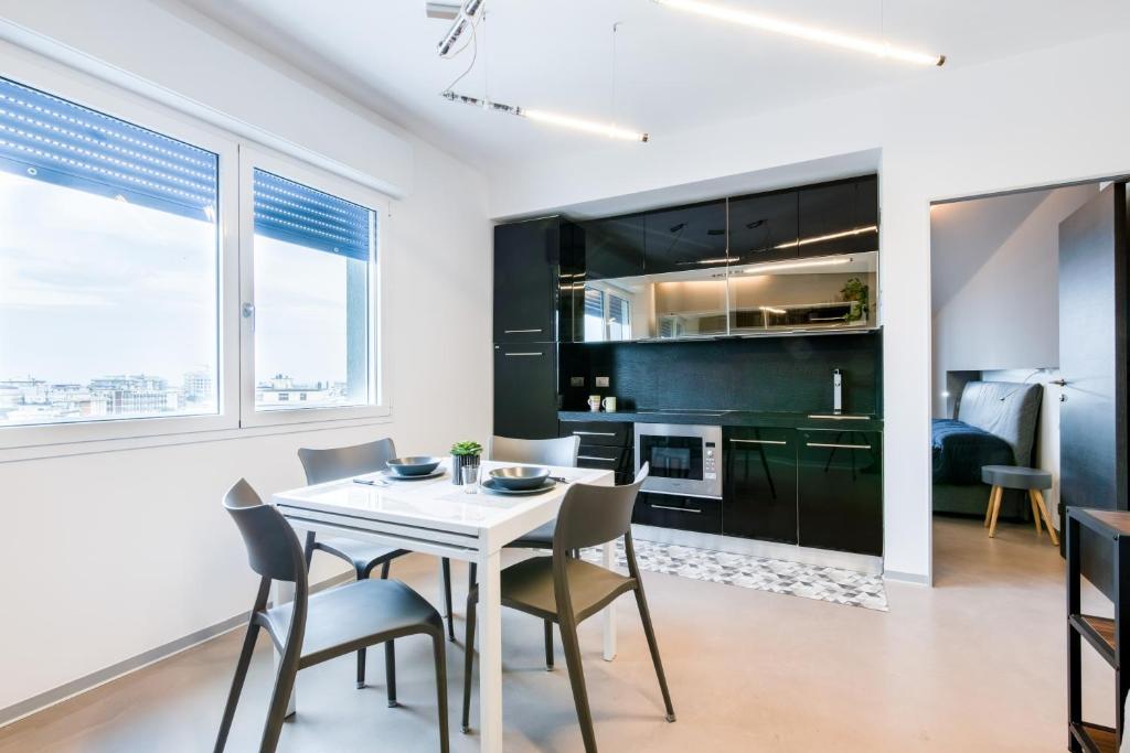 Kuchyňa alebo kuchynka v ubytovaní Rimini Marina Centro Station Apartment