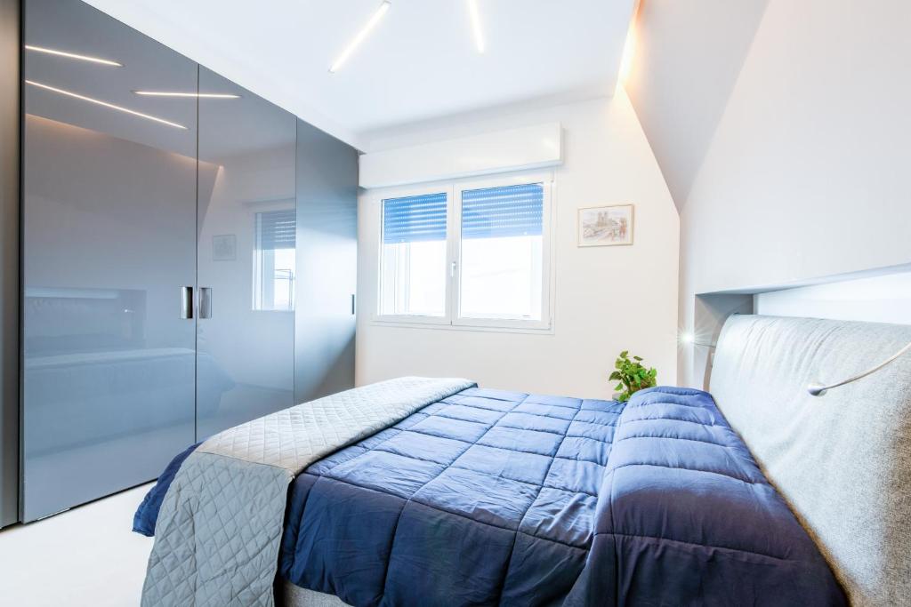 Posteľ alebo postele v izbe v ubytovaní Rimini Marina Centro Station Apartment
