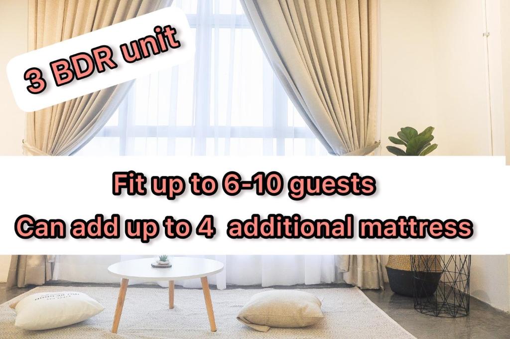 a banner for a room with a table and a window at Yong Peng homestay 永平民宿- 3 Bedroom, Free Parking, Free Netflix, Unlimited WIFI, Walking distance to KFC & MCD in Yong Peng