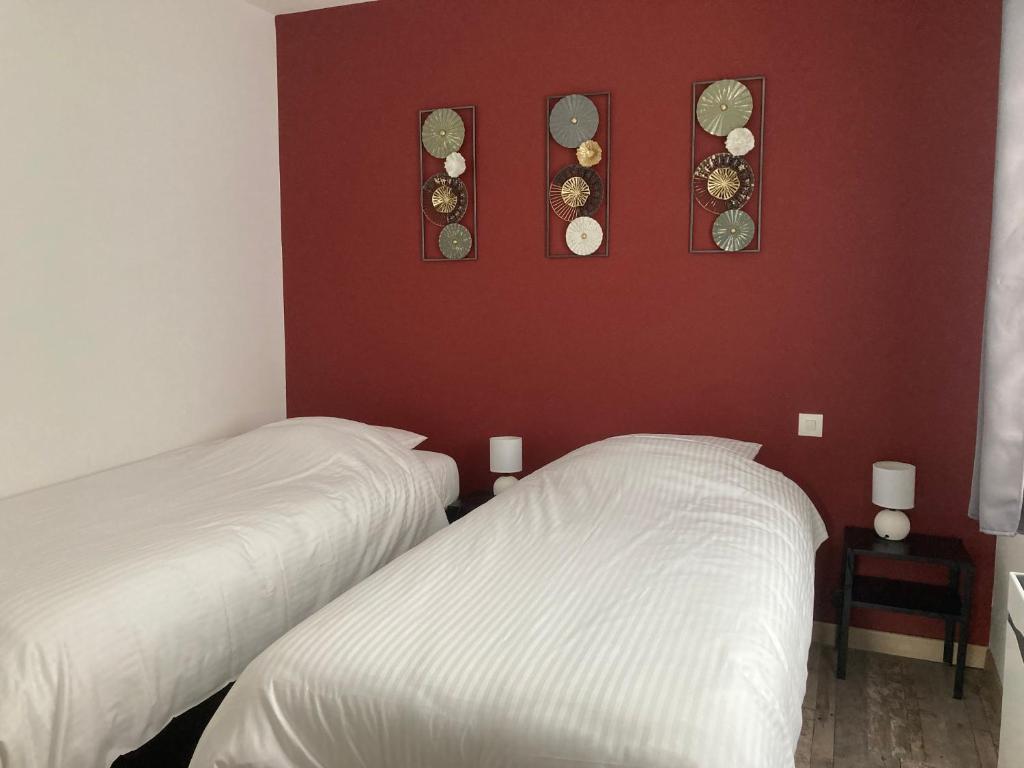 Postel nebo postele na pokoji v ubytování L'Escapade
