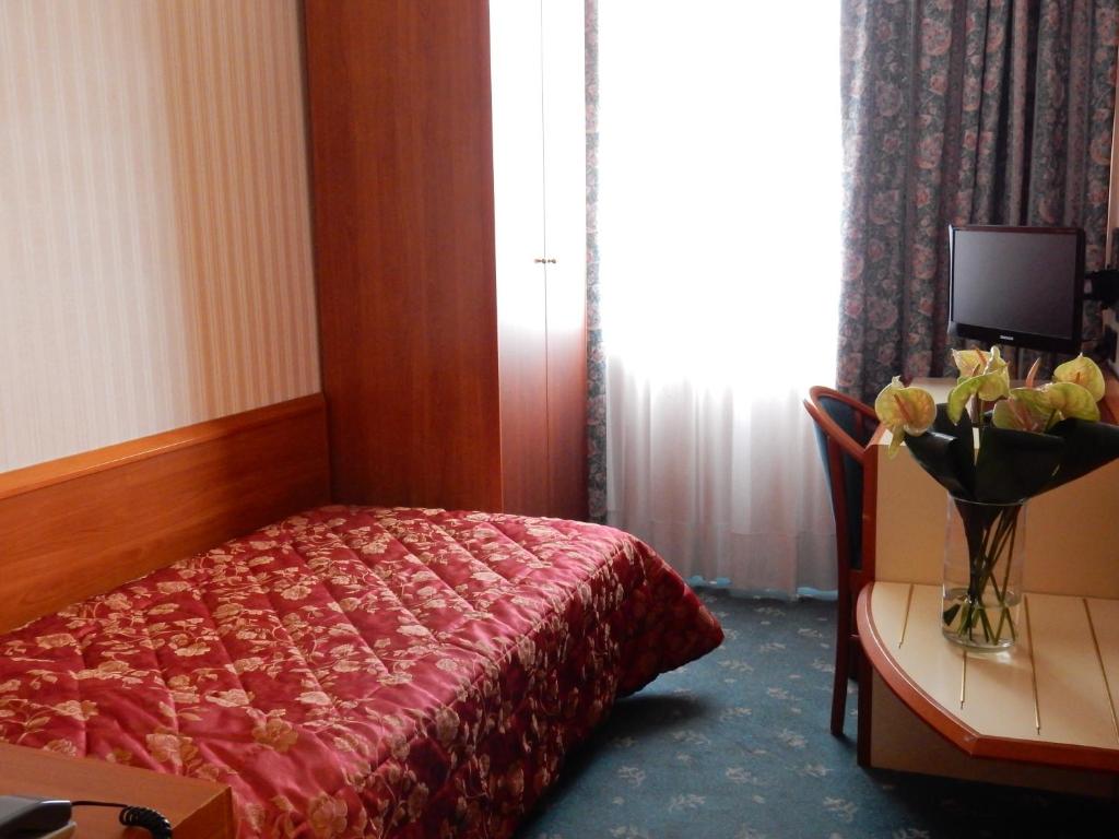 Postel nebo postele na pokoji v ubytování Hotel Brennero