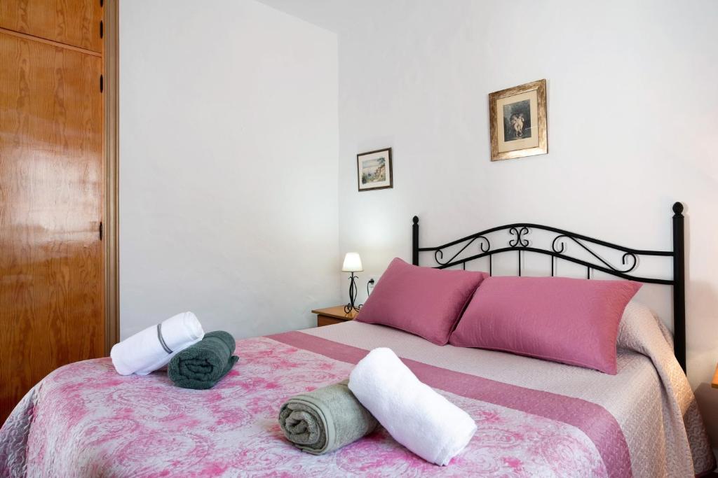 A bed or beds in a room at Casa Antonia 3