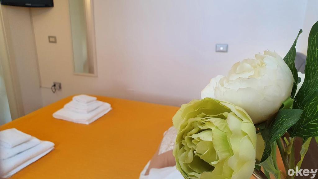 A bed or beds in a room at Garden House - Casa Vacanze Bari