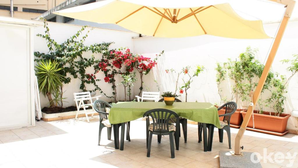 A patio or other outdoor area at Garden House - Casa Vacanze Bari