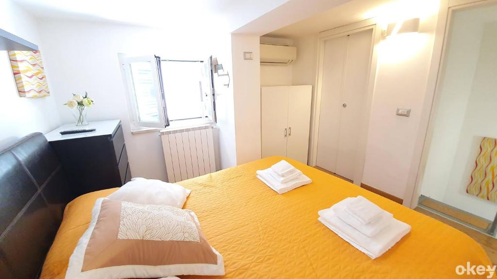A bed or beds in a room at Garden House - Casa Vacanze Bari