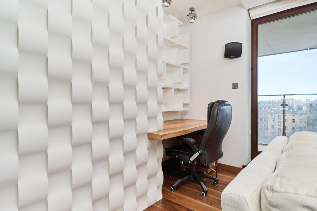 Posteľ alebo postele v izbe v ubytovaní Luxurious Apartments Walonska with underground GARAGE by Noclegi Renters