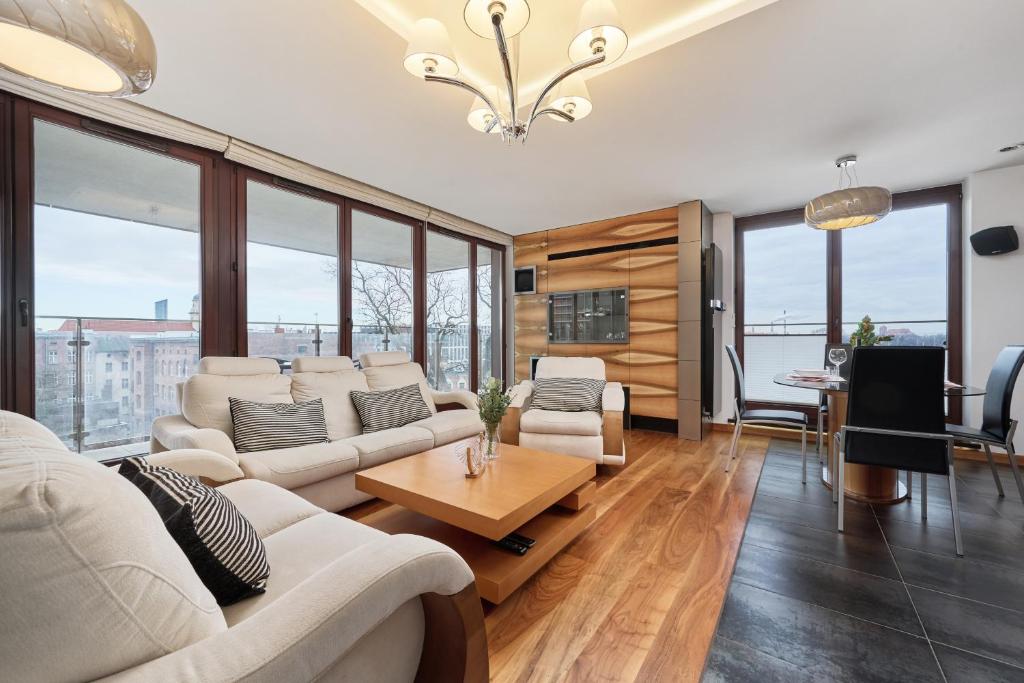 Posedenie v ubytovaní Luxurious Apartments Walonska with underground GARAGE by Noclegi Renters