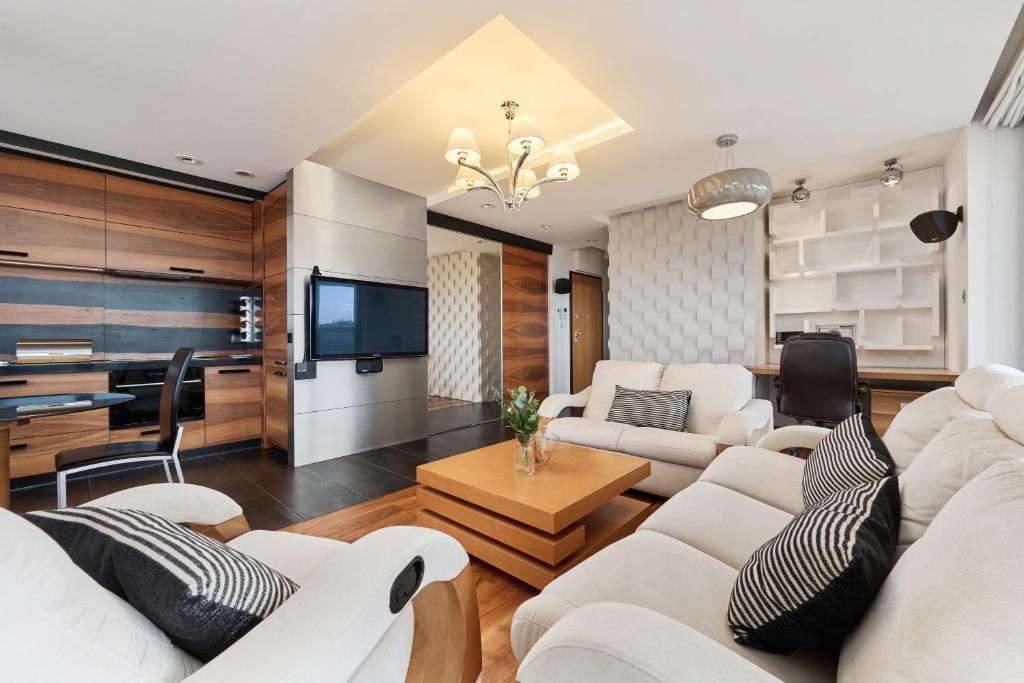 Posedenie v ubytovaní Luxurious Apartments Walonska with underground GARAGE by Noclegi Renters