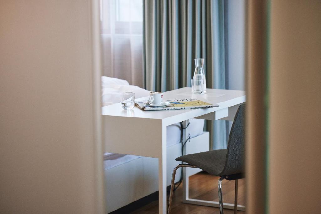 Krevet ili kreveti u jedinici u okviru objekta Hotel am See