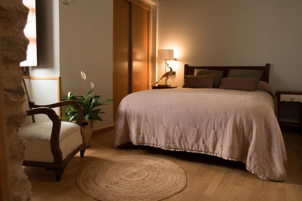 Posteľ alebo postele v izbe v ubytovaní Hostal Pension Artilleiro