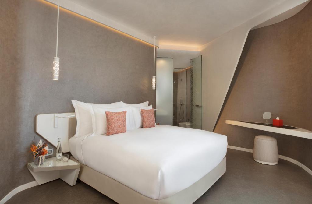 Postel nebo postele na pokoji v ubytování Pestana CR7 Marrakech