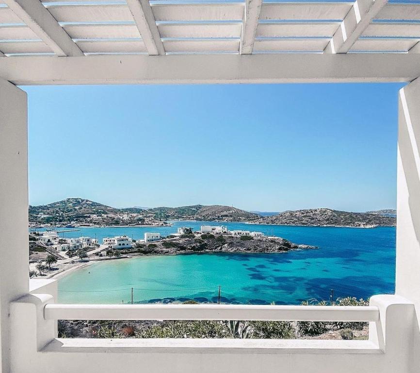 a view of the ocean from a window at Nautilus Apartments in Lipsoi