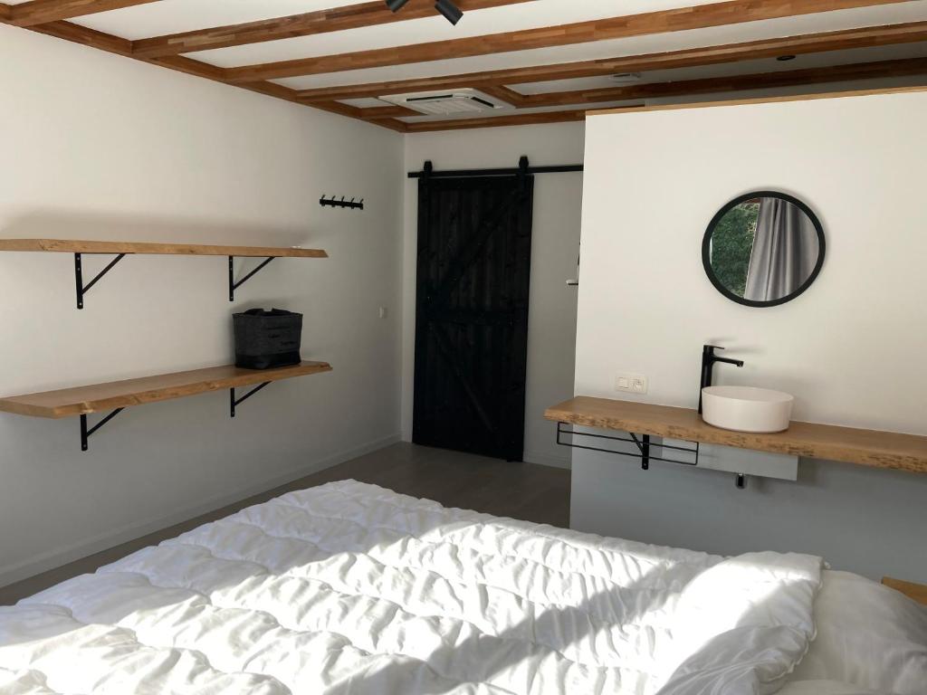 Postel nebo postele na pokoji v ubytování Villa Dhoris