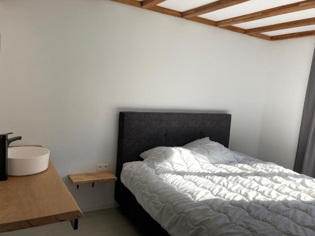 Postel nebo postele na pokoji v ubytování Villa Dhoris