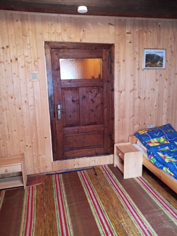 Postel nebo postele na pokoji v ubytování Chata Tereza