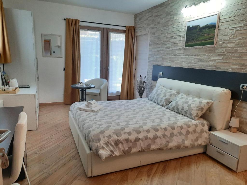 Postel nebo postele na pokoji v ubytování Il Vigneto
