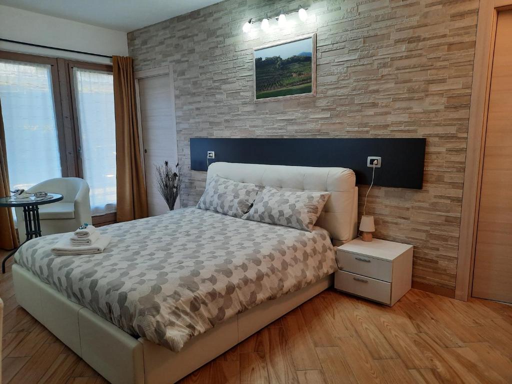 Postel nebo postele na pokoji v ubytování Il Vigneto
