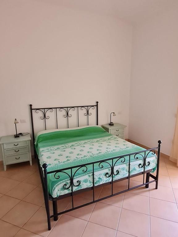 A bed or beds in a room at Dimora San Pietro