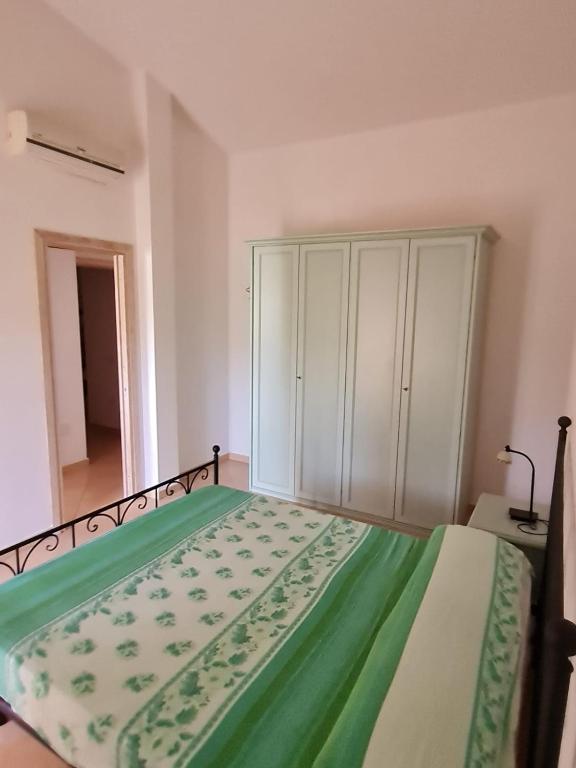 A bed or beds in a room at Dimora San Pietro