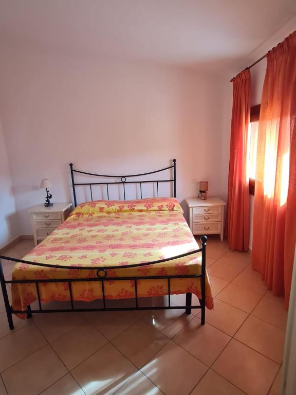 A bed or beds in a room at Dimora San Pietro