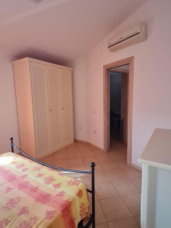 A bed or beds in a room at Dimora San Pietro